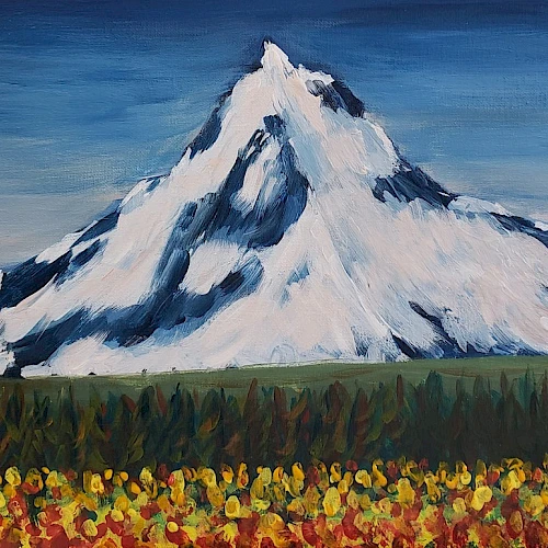 A snowy mountain peak with a bright blue sky and a foreground of colorful flowers, creating a vibrant landscape scene.