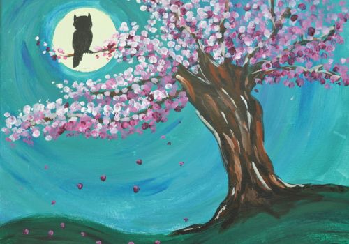A silhouette of an owl on a branch of a blossoming tree against a bright full moon in a vibrant night sky.